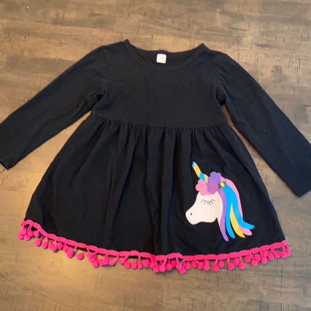 Black long sleeve unicorn shirt .